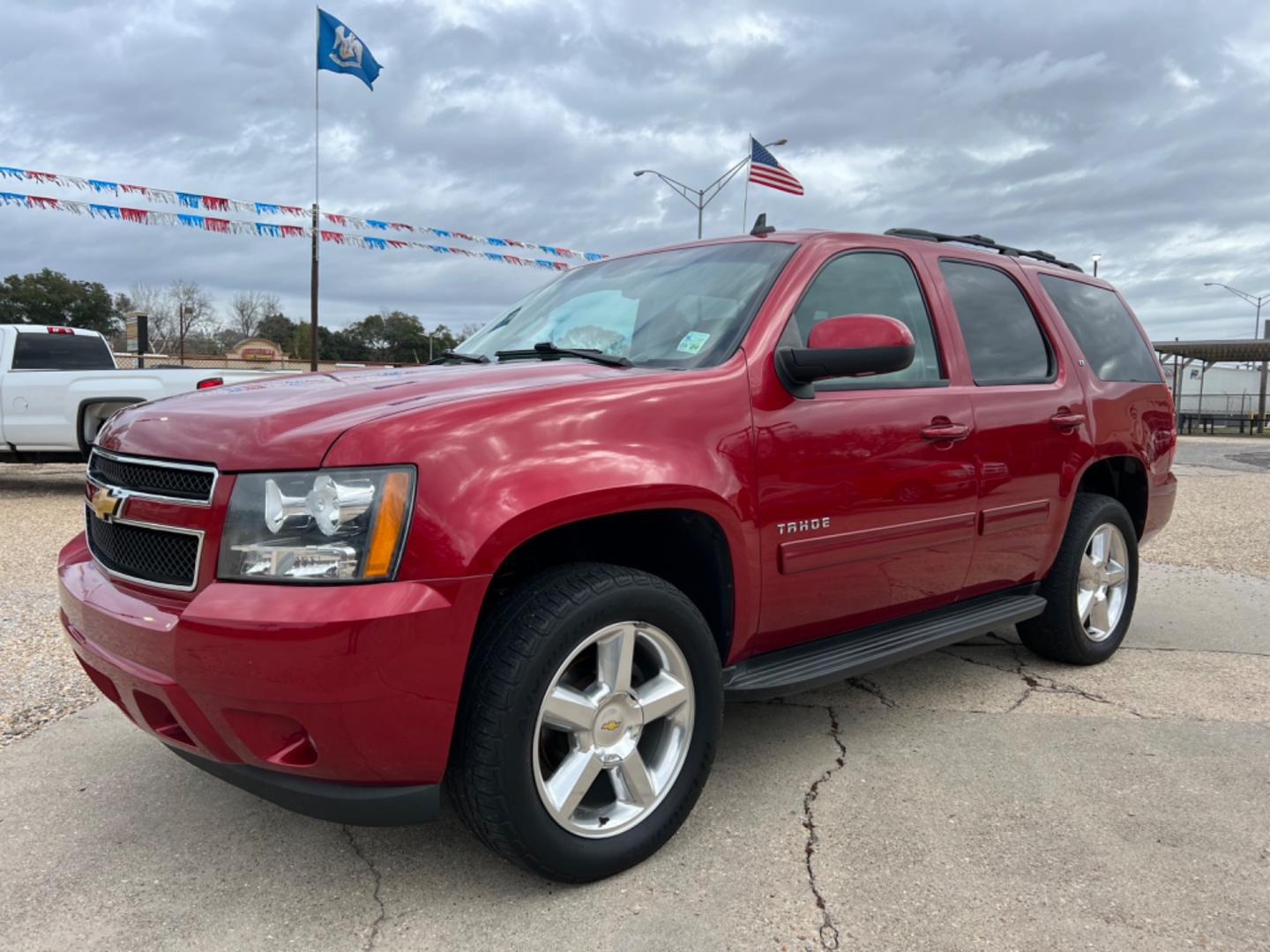 2013 Maroon /Tan Chevrolet Tahoe LT (1GNSCBE02DR) with an 5.3L V8 engine, Automatic transmission, located at 4520 Airline Hwy, Baton Rouge, LA, 70805, (225) 357-1497, 30.509325, -91.145432 - 2013 Chevy Tahoe LT 149K Miles, 5.3 V8, Heated Leather Seats, All Power, Seats 7, Bose Stereo, Tow Pkg. NO IN HOUSE FINANCING. FOR INFO PLEASE CONTACT JEFF AT 225 357-1497 CHECK OUT OUR A+ RATING WITH THE BETTER BUSINESS BUREAU WE HAVE BEEN A FAMILY OWNED AND OPERATED BUSINESS AT THE SAME LOCATION F - Photo#0